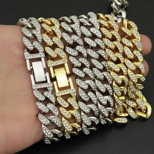 Hip hop style 12mm Cuban link chain in gold and silver finish with iced out rhinestones