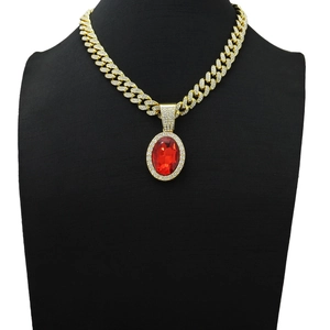 Hip hop cuban link chain with oval red ruby pendant and white crystal halo in gold finish
