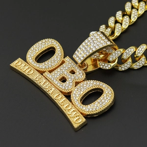 Golden hip-hop OBO pendant necklace with iced-out Cuban link chain and diamonds
