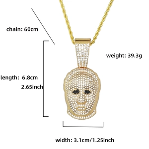 Detail view of hiphop gold mask pendant with sparkling rhinestones and twisted chain measurements