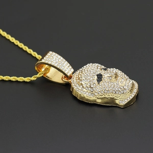 Hiphop gold rope chain necklace featuring a mask pendant with iced out clear crystals