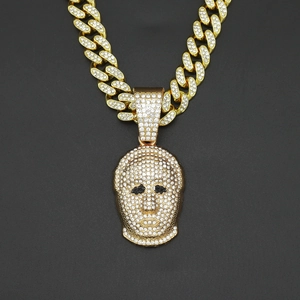 Hiphop gold cuban chain with iced out mask pendant featuring sparkling zircons and black eyes