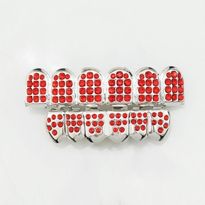 Macro view of silver HIPHOP teeth grillz set featuring micro-paved vibrant red rhinestones