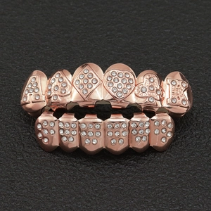 Iced out rose gold hip hop grillz set with poker patterns and white rhinestones