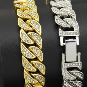 Iced out leaf cuban link bracelet in gold and silver plating with cubic zirconia stones