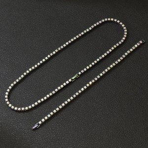 Detail of hip-hop tennis chain with iridescent AB crystals and black nickel finish