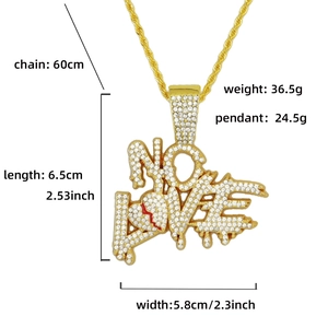 Macro shot showing dimensions of the NO LOVE broken heart hip-hop necklace with iced-out stones