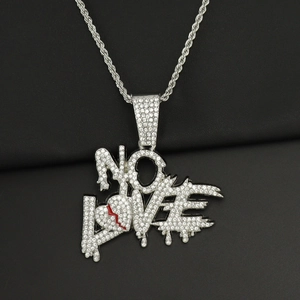 Close-up of hip hop pendant with NO LOVE dripping letters and icy micro-pave crystals