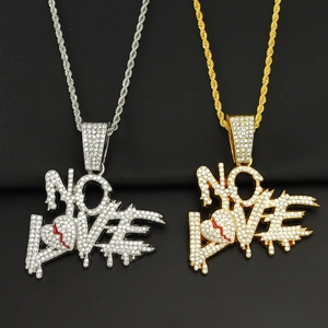 Detailed close-up of gold and silver iced-out NO LOVE heart pendants with twisted chains