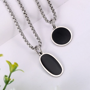 Minimalist silver stainless steel pendant necklace set with black oval and round charms