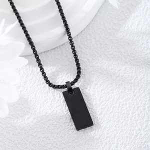 Minimalist matte black stainless steel rectangle tag necklace with a sleek box chain