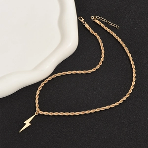Fashionable gold twisted chain necklace with a lightning bolt pendant for a stylish look