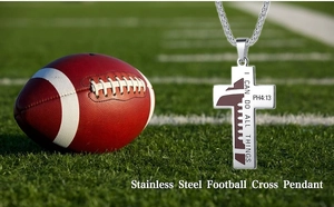 Detail of silver stainless steel football cross necklace with Bible verse engraving