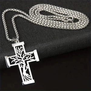 Silver stainless steel hollow tree of life cross necklace with bead chain on black background