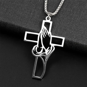 Polished silver stainless steel hollow cross necklace with praying hands and scroll patterns