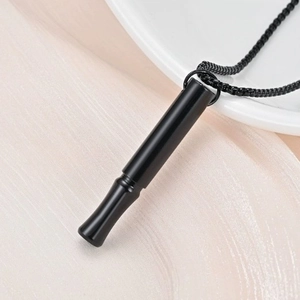 Minimalist black stainless steel meditation whistle necklace for mindful breathing