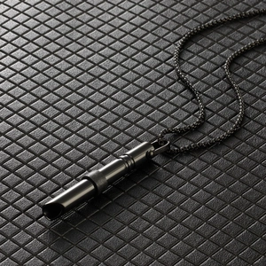 Mindfulness breathing whistle necklace with rotating beads in sleek black titanium steel