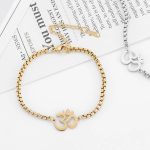 Bracelet doré en acier inoxydable avec pendentif symbole Om et chaîne vénitienne raffinée