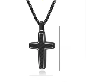 Detailed view of black cross pendant with honeycomb texture and silver metal edges