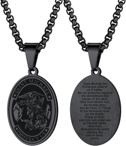 Close-up of Saint Michael shield pendant with detailed prayer engraving on black steel