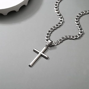 Sleek silver stainless steel cross pendant necklace with thick cuban chain for men
