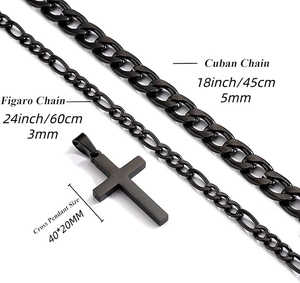 Detail view of double-layered stainless steel Cuban chain and cross pendant