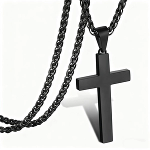 Men's matte black stainless steel cross pendant necklace with wheat chain on white background