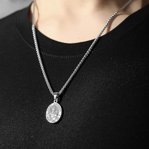 Saint Anthony silver stainless steel pendant necklace on male model with wheat chain