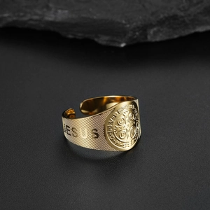 Detail of golden Saint Benedict medal on stainless steel adjustable Jesus ring