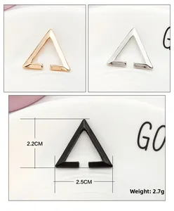 Minimalist geometric triangle ear cuff in gold silver and black finish showing size details