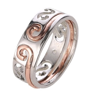 Two-tone silver and rose gold hollow filigree ring with intricate scroll patterns