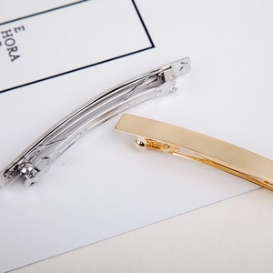 Minimalist geometric metal hair clips in gold and silver finish with spring barrettes