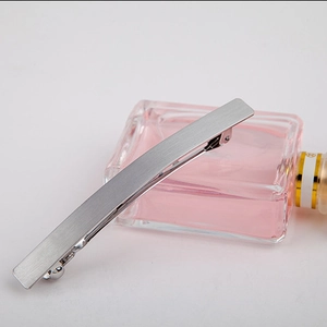 Minimalist matte silver rectangular metal hair clip with brushed texture for women