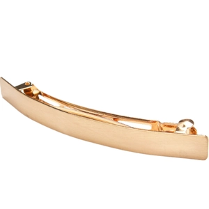 Sleek gold metal spring hair clip with a minimalist curved bar design on white background