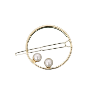 Elegant gold metal circular hair clip featuring two white pearls on a minimalist barrette