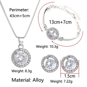 Detailed specs of silver halo jewelry set with large round cubic zirconia stones