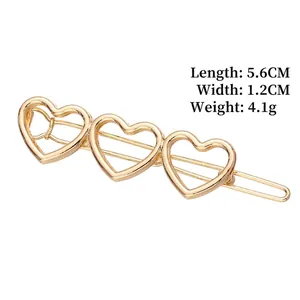Goldene minimalistische Haarspange mit drei durchbrochenen Herzen für Damen