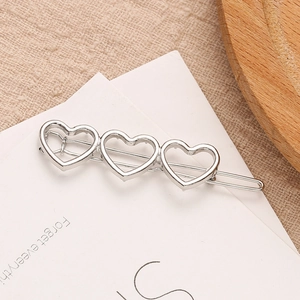 Poliertes silbernes Herz-Haarclip mit drei hohlen Herzformen für Damen-Haarstyling