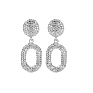 Detail view of silver oval drop earrings with intricate white crystal rhinestone inlay