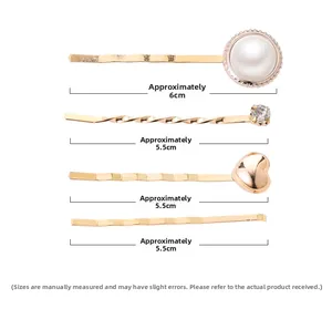 Set of four gold-finish pearl and heart hair clips with precise size measurements