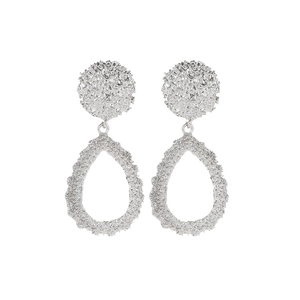 Modern silver water drop earrings with irregular lava texture in a sleek minimalist style