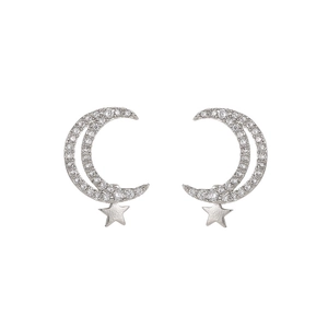 Macro detail of crescent moon and star earrings with micro-set cubic zirconia stones