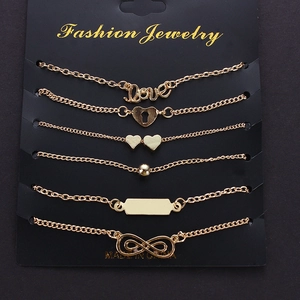 Set of 6 gold-tone charm bracelets featuring Love, heart, and infinity symbols for women