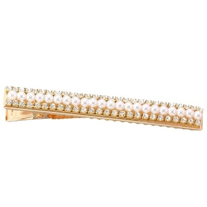 Barrette à cheveux dorée élégante avec perles blanches et strass sur fond blanc