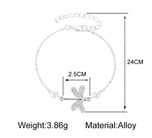 Silver alloy dragonfly anklet detail with white pearls and 24cm chain length dimensions