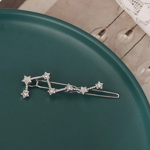 Silver North Star crystal hair clip with alloy rhinestones in elegant still life setting