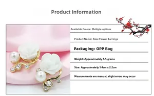 Close-up of pearl flower earrings with gold petals and dimensions on silk background