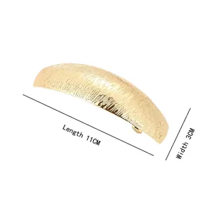 Golden brushed metal hair clip with arched spring design, 11cm length, 3cm width size