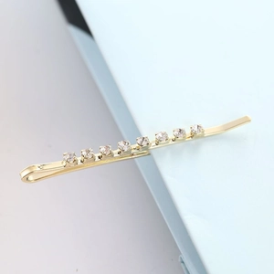 Barrette à cheveux minimaliste en métal doré ornée de huit strass ronds brillants