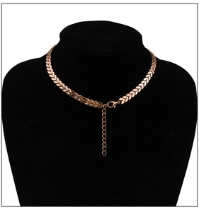 Detailed shot of rose gold herringbone chain necklace with lobster clasp and extension